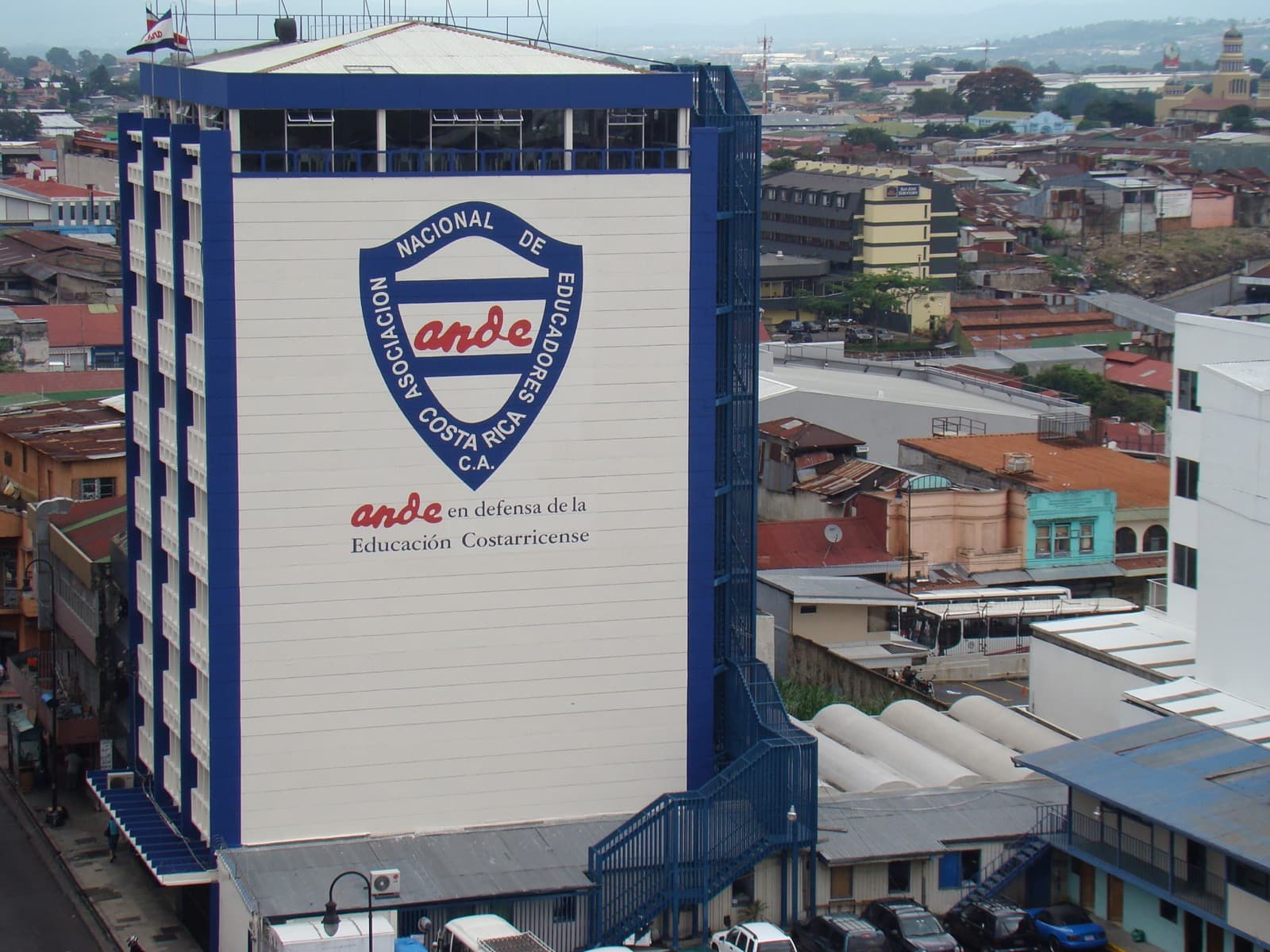ANDE institutional building with the organization logo on the facade.