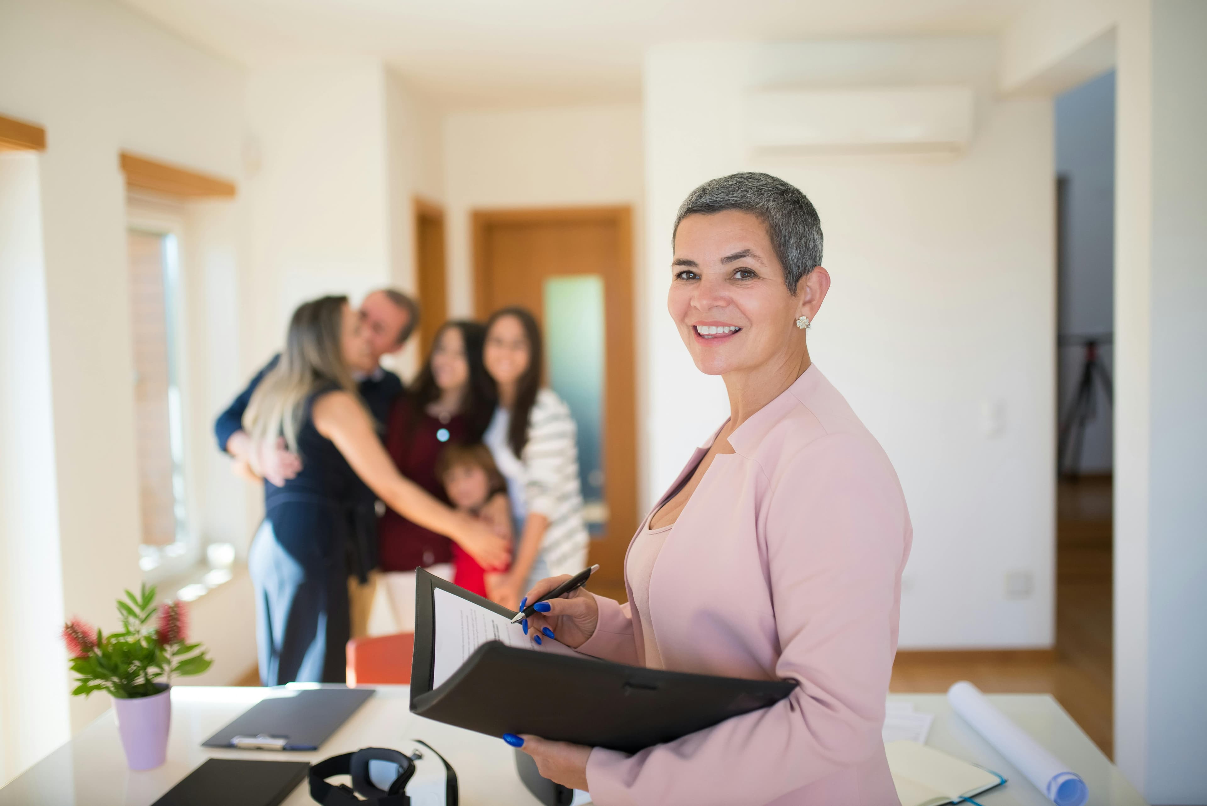 Real estate agent preparing a property showing.