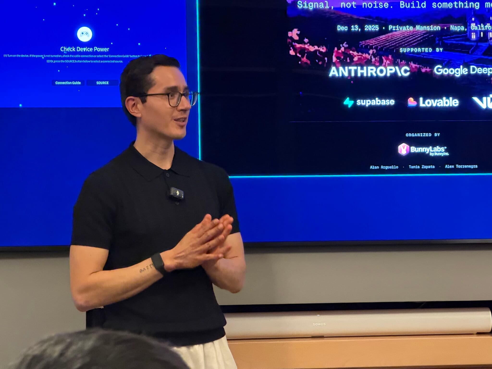 Alan Arguello facilitating an AI Board Members session in front of a screen