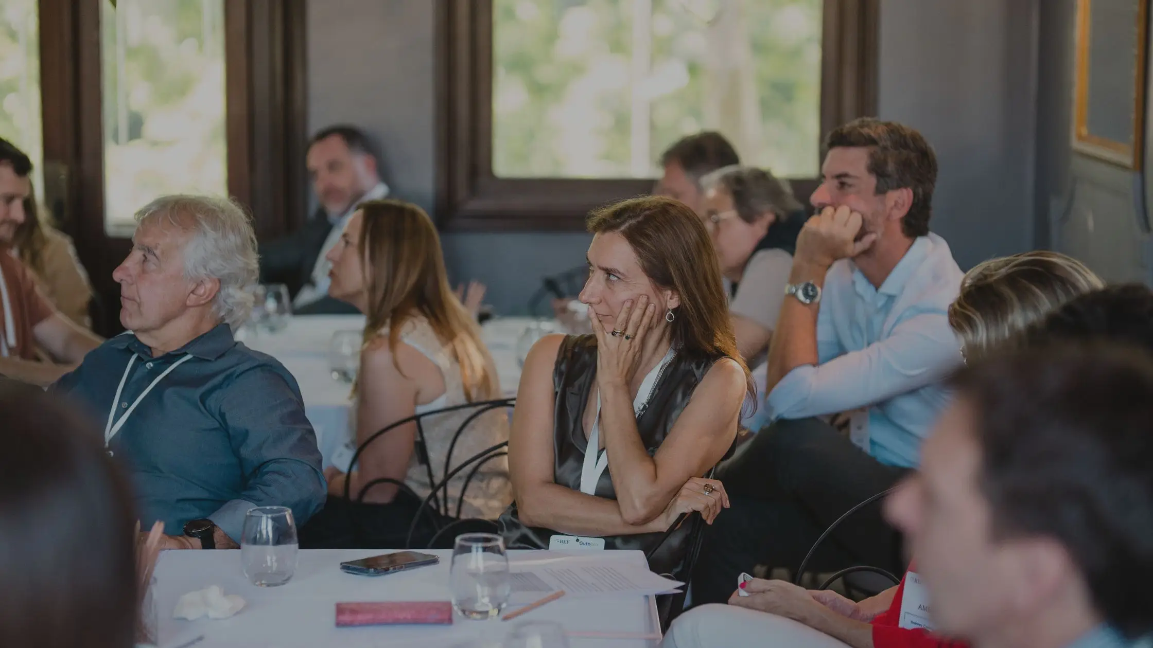 Leaders listening to an executive discussion in a private session